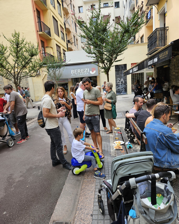 Local families out in the streets near Bar Roberto Berri in San Sebastian