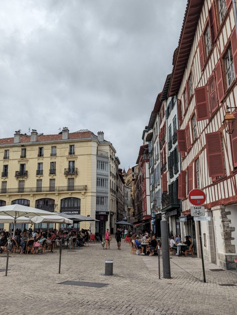 Outdoor cafes and small apartments in Bayonne France.